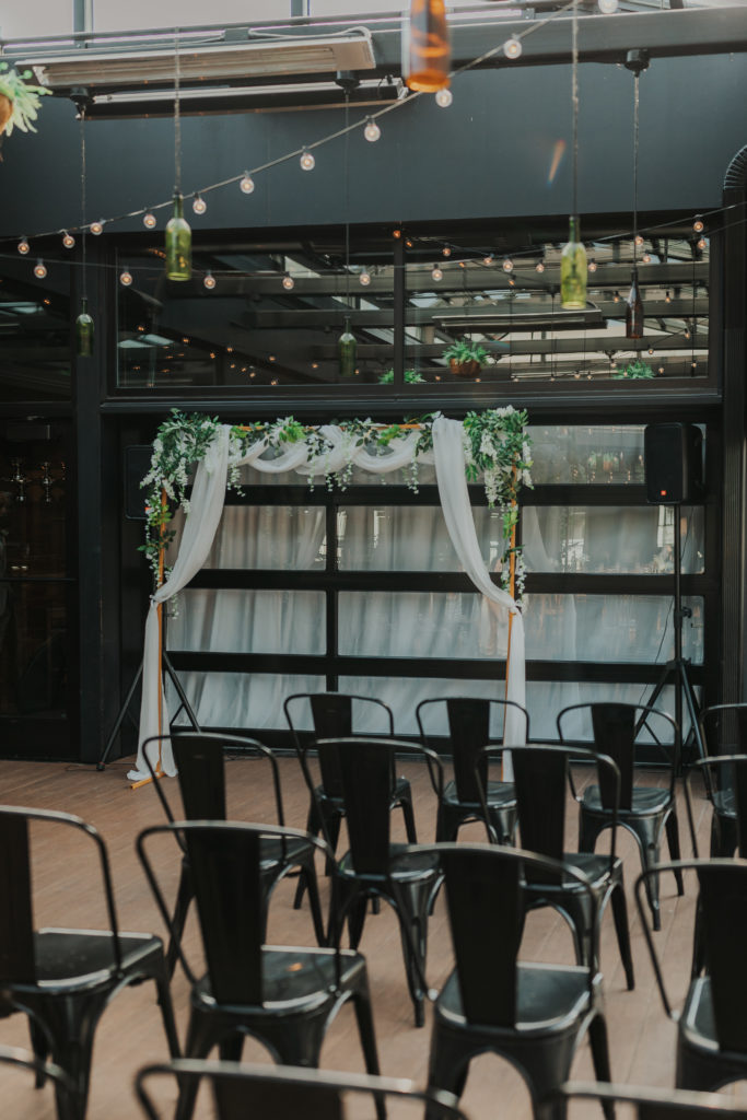 Small, intimate wedding ceremony at the Pizza Man restaurant in Milwaukee