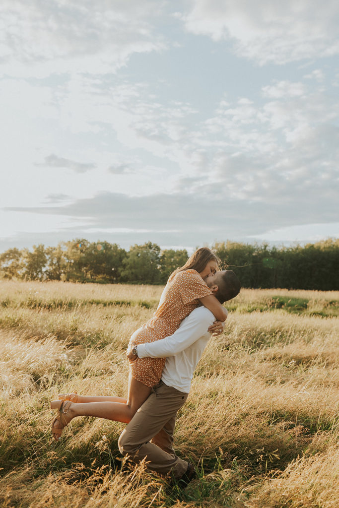 outdoor engagement session with playful couple 