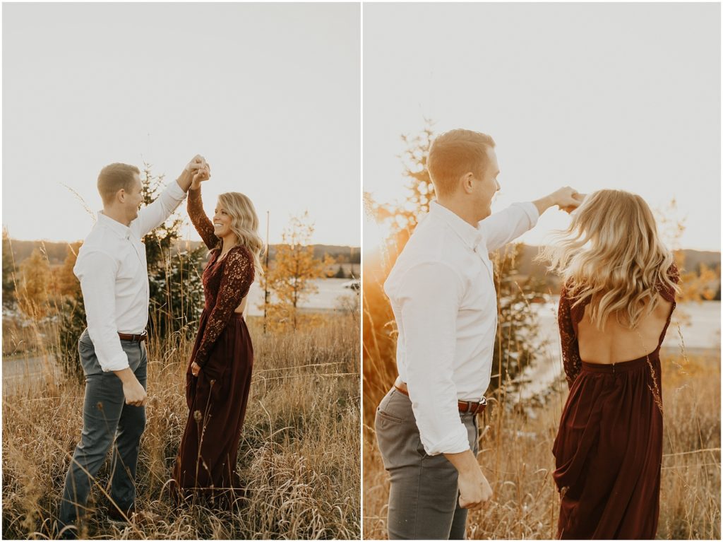 fall engagement session, engaged couple in a meadow holding each other 