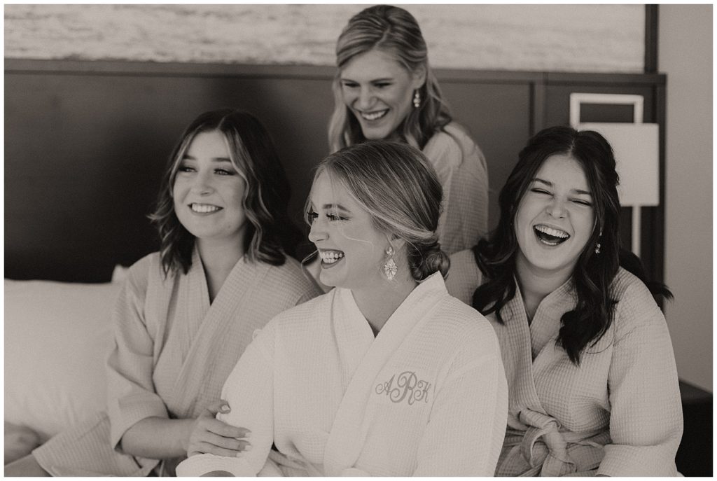 bride and her bridesmaids in robes
