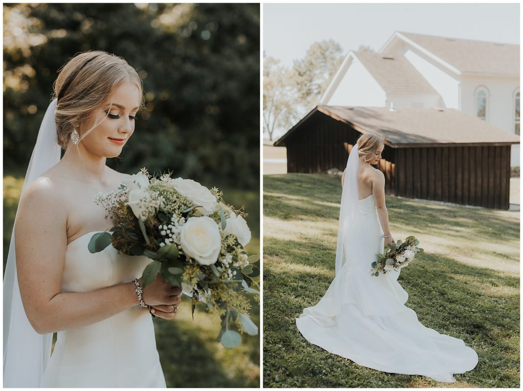 bride on her wedding day, holding a bouquet of white roses, babies breath, and eucalyptus