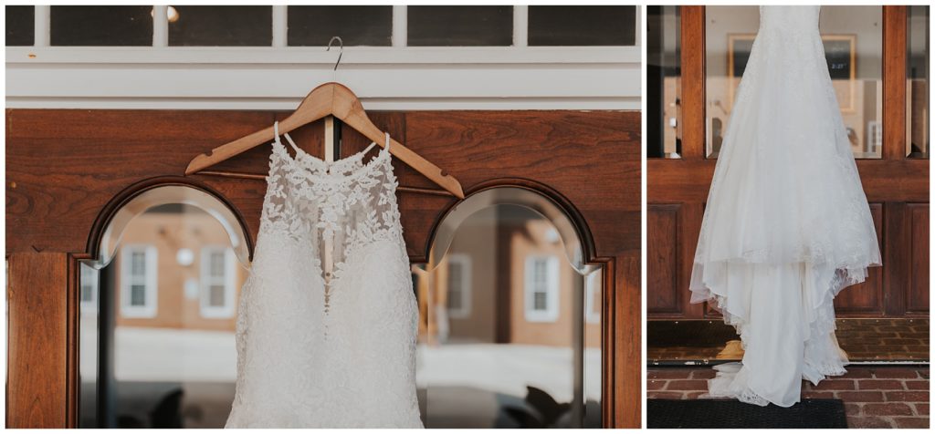 lace wedding dress hanging up 