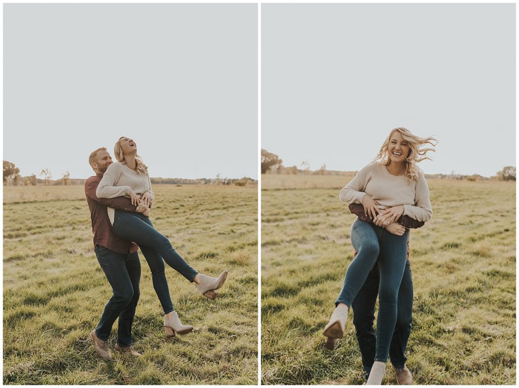 couple taking portraits and spinning around in a field during golden hour