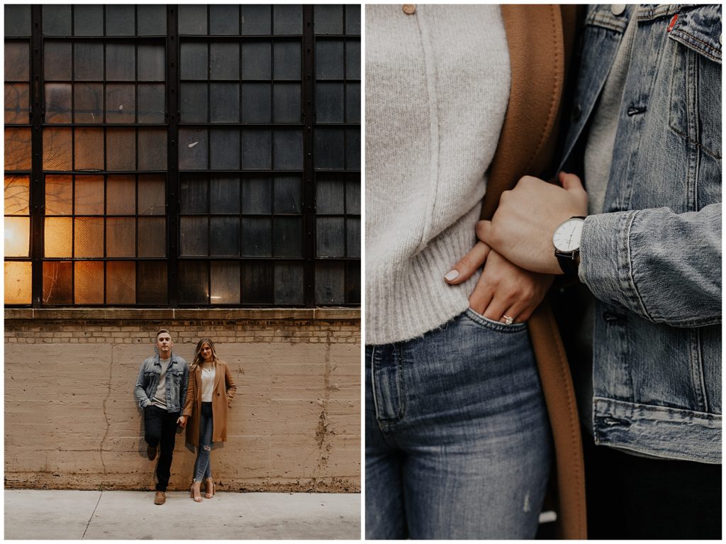 couples engagement session walking down the city streets on a fall day in Wisconsin