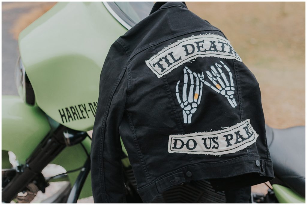 Bride's black denim jacket that says " til death do us part"