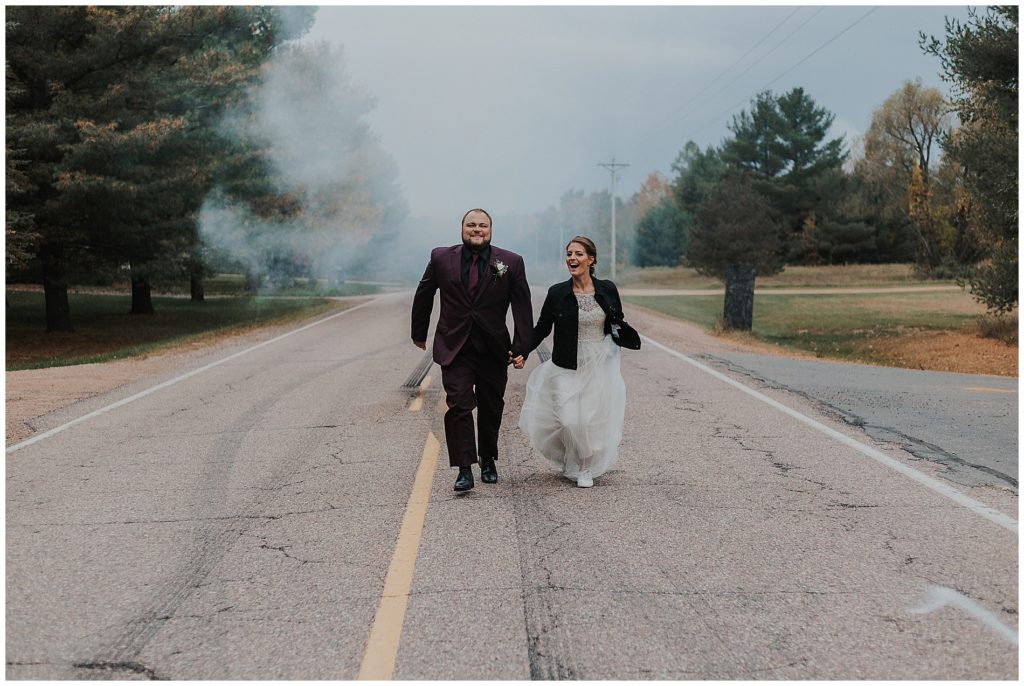 bride and groom photos with a smoke bomb