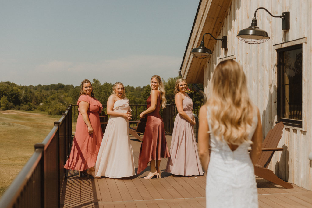 modern rustic outdoor bridesmaids first look