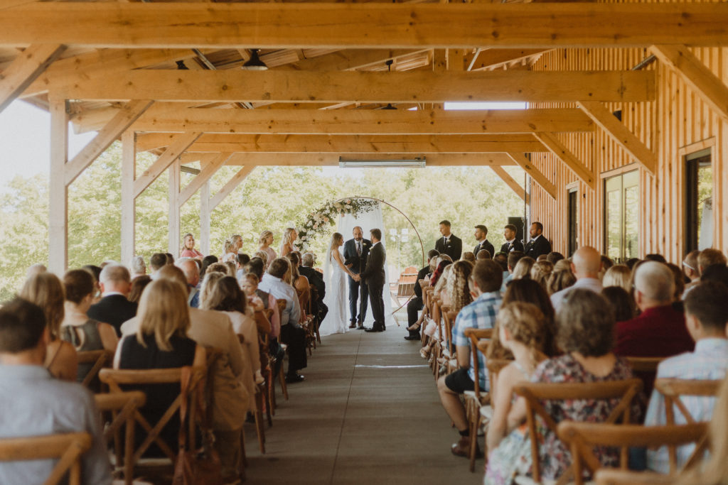covered outdoor porch ceremony modern rustic wedding