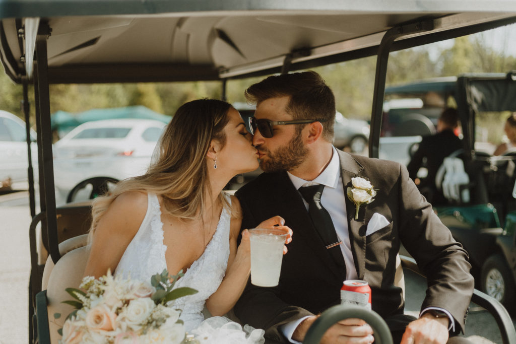 modern rustic wedding golf cart bride and groom photo